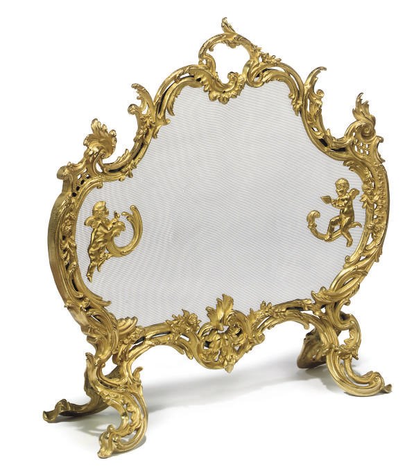 A GILT BRONZE FIRESCREEN