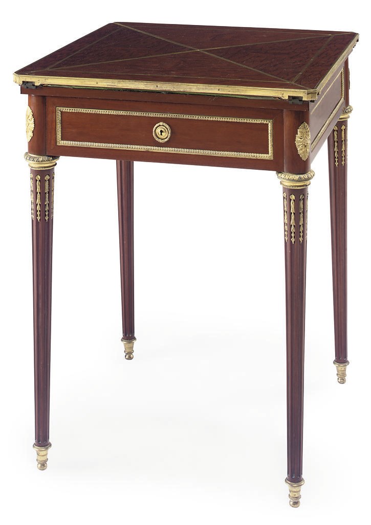 A FRENCH GILT METAL MOUNTED MAHOGANY ENVELOPE CARD TABLE