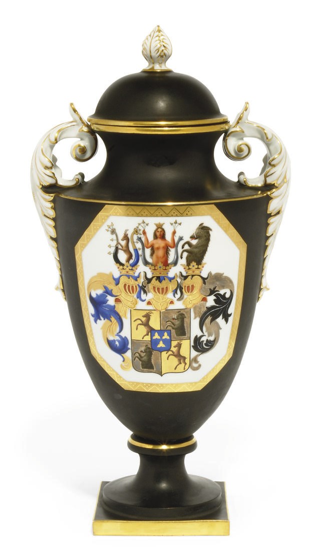 A PORCELAIN ARMORIAL VASE AND COVER