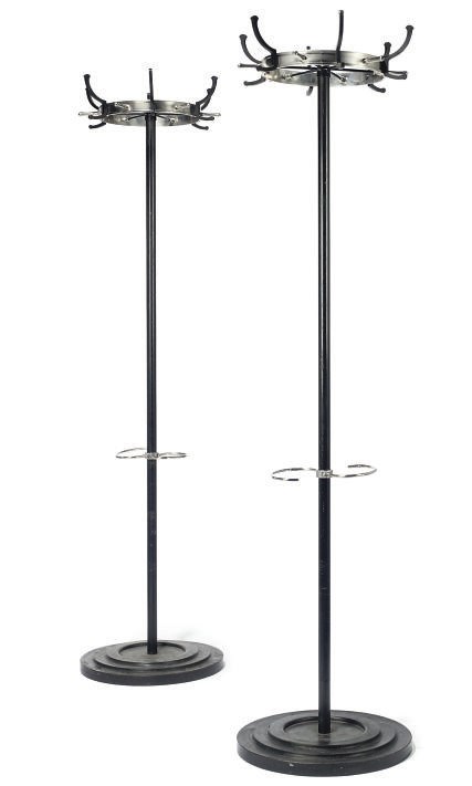 A PAIR OF CHROMIUM PLATED AND METAL COAT STANDS