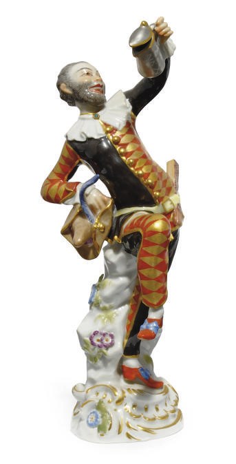 A MEISSEN FIGURE OF HARLEQUIN