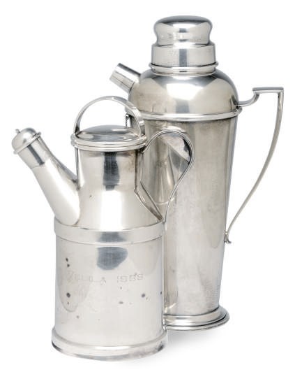 AN AMERICAN SILVER COCKTAIL SHAKER AND A SILVER-PLATED DECANTER IN THE FORM OF A MILK CAN,
