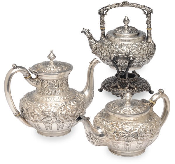 AN AMERICAN SILVER REPOUSSE FIVE PIECE TEA AND COFFEE SERVICE,