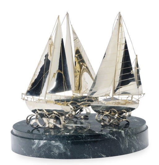 THREE FRENCH SILVER SAILBOAT MODELS MOUNTED ON A MALACHITE BASE,