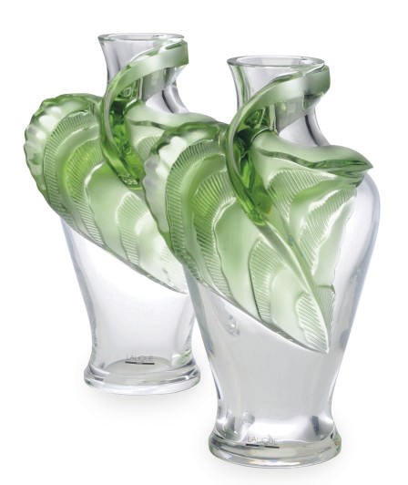 A PAIR OF FRENCH GLASS VASES MOLDED WITH LEAVES,
