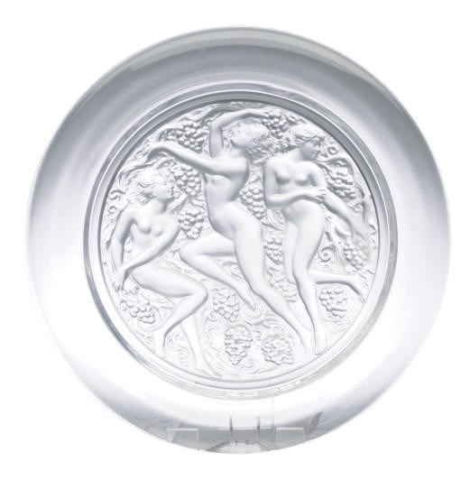 A FRENCH CIRCULAR CHARGER MOLDED WITH MAIDENS AMONG GRAPEVINES,