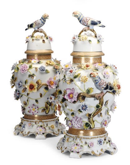 A PAIR OF MEISSEN-STYLE FLOWER ENCRUSTED VASES AND COVERS,