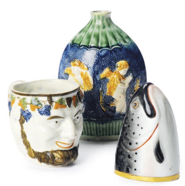 AN ENGLISH PEARLWARE BLUE-GROUND FLASK AND SATYR-MASK MUG