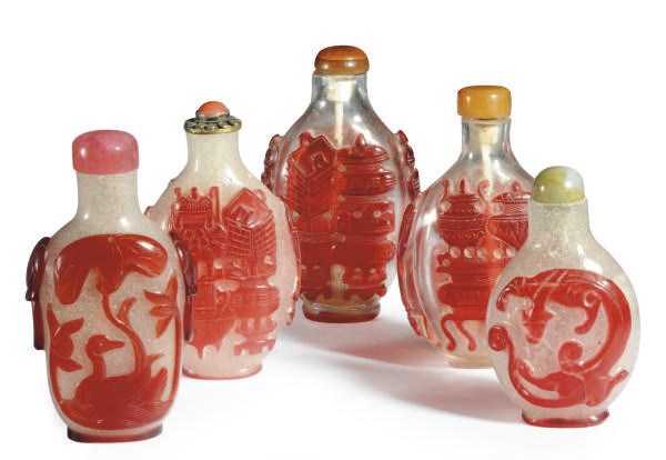 A GROUP OF FIVE CHINESE CARVED RED OVERLAY GLASS SNUFF BOTTLES,**