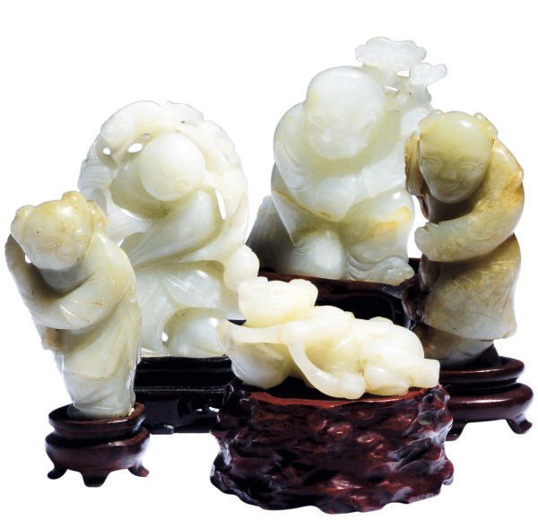 A GROUP OF TWENTY-SEVEN SMALL CHINESE JADE FIGURES,