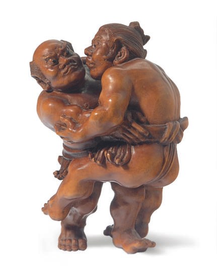A JAPANESE CARVED WOOD FIGURE GROUP OF TWO SUMO WRESTLERS,