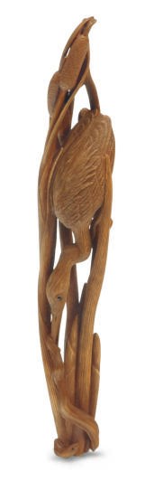 A JAPANESE CARVED WOOD FIGURE OF A CRANE CATCHING A SNAKE,