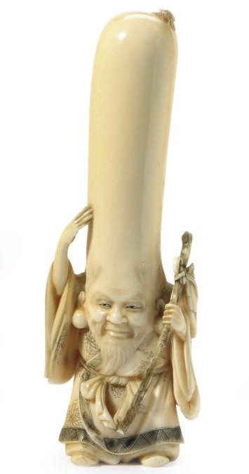 A JAPANESE IVORY CARVED FIGURE OF FUKUROKUJU,**