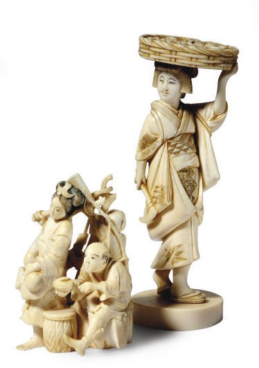 A JAPANESE IVORY CARVINGS OF A FAMILY GROUP AND A WOMAN WITH A VEGETABLE BASKET,**