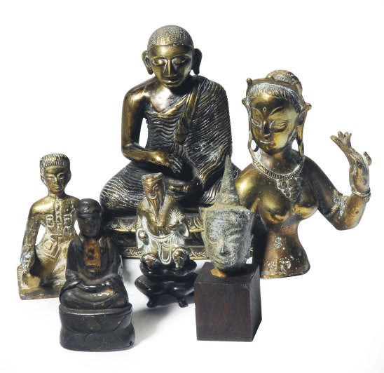 A GROUP OF SIX SMALL ASIAN BRONZE DEVOTIONAL FIGURES AND AN ARCHAISTIC-STYLE BRONZE RING,