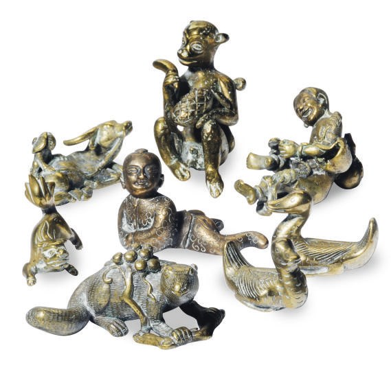 A GROUP OF TWO ASIAN BRONZE FIGURES AND SEVEN ANIMALS,
