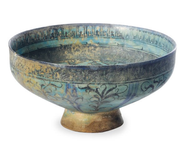 A KASHAN TURQUOISE-GLAZED POTTERY BOWL,**