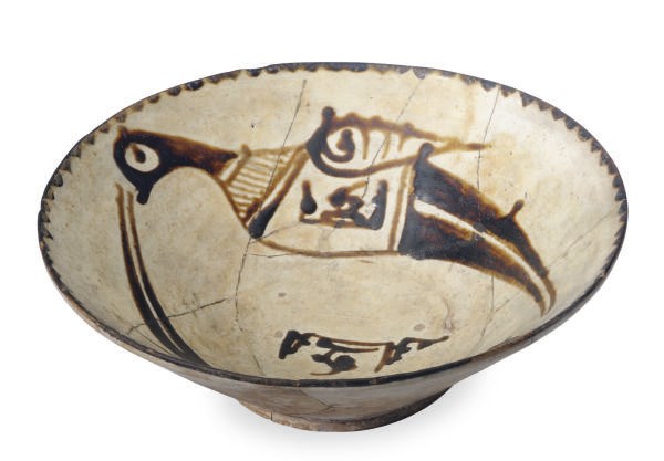 A NISHAPUR CONICAL POTTERY BOWL,