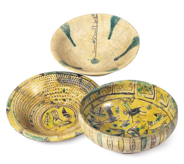 A GROUP OF THREE NISHAPUR POTTERY BOWLS,