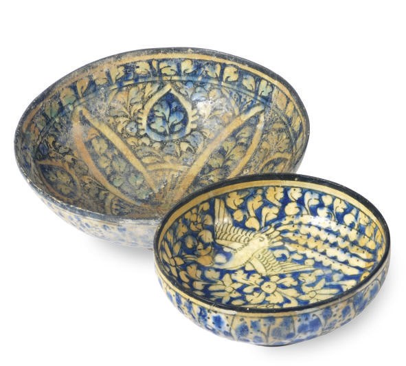 A NISHAPUR POTTERY BOWL AND A SULTANABAD POTTERY BOWL,