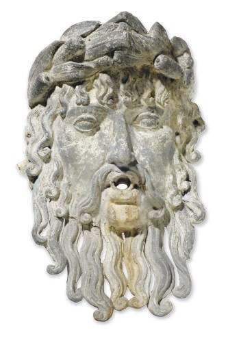 A LEAD FOUNTAIN FIGUREHEAD,