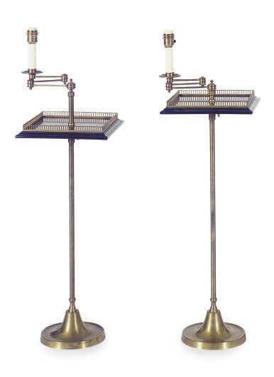 A PAIR OF MAHOGANY AND BRASS FLOOR LAMPS,