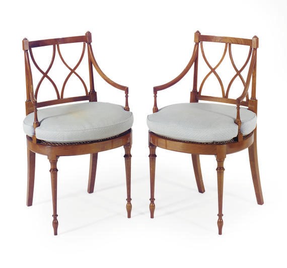 A PAIR OF FRUITWOOD AND CANED OPEN ARMCHAIRS,