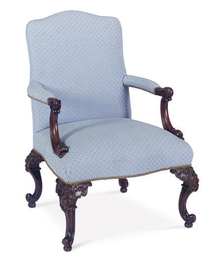 A MAHOGANY AND UPHOLSTERED OPEN ARMCHAIR,