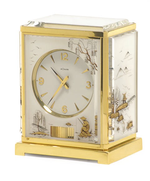A SWISS BRASS AND PLEXIGLASS 'ATMOS' CLOCK,