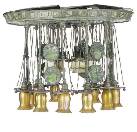 AN AMERICAN ARTS AND CRAFTS PATINATED BRONZE, LEADED GLASS AND IRIDESCENT GLASS EIGHTEEN-LIGHT CHANDELIER,