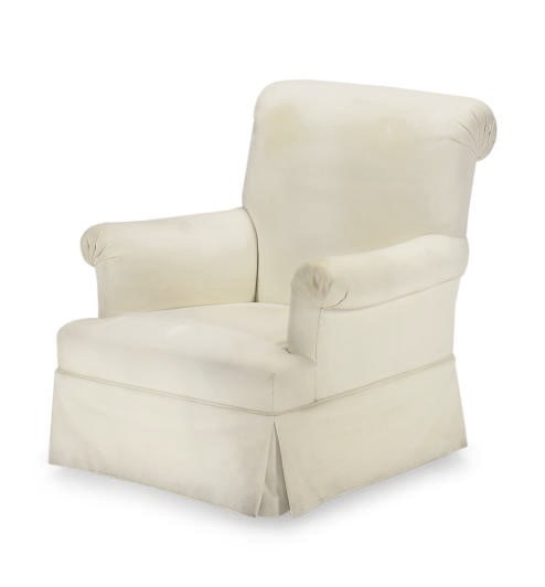 AN UPHOLSTERED CLUB CHAIR,