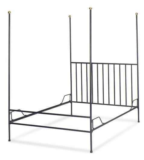 A STEEL AND BRASS BED,