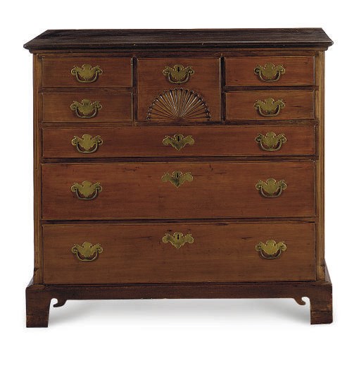 AN AMERICAN WALNUT CHEST-OF-DRAWERS,