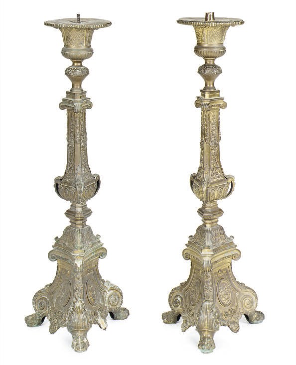 THREE CONTINENTAL GILT-BRONZE ALTAR STICKS,