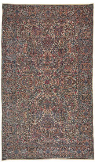 A KIRMAN CARPET,
