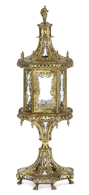 A CONTINENTAL BRASS STANDING LANTERN,
