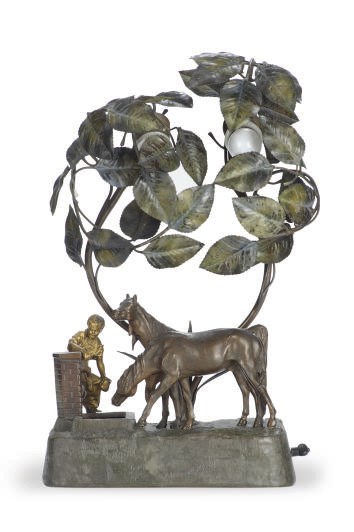 A PATINATED AND GILT-METAL FIGURAL TABLE LAMP,