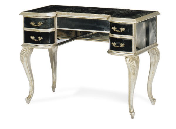 A SILVERED-WOOD AND MIRRORED DRESSING TABLE,