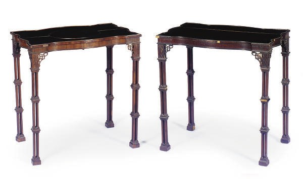 A NEAR PAIR OF ENGLISH MAHOGANY SILVER TABLES,