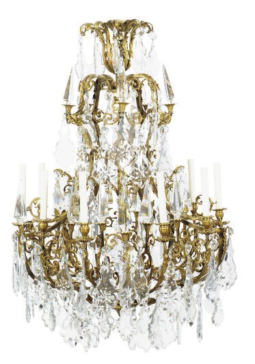 A GILT-METAL AND CUT-GLASS TEN-LIGHT CHANDELIER,