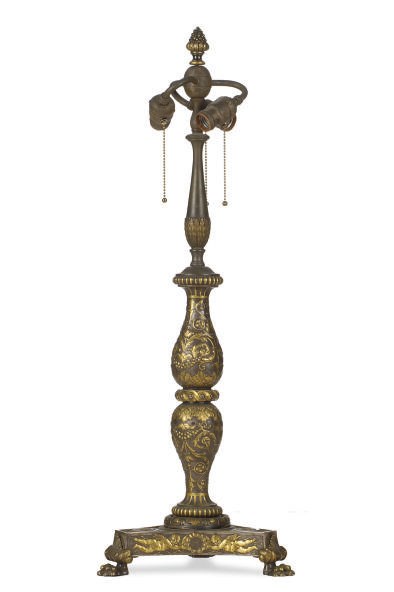 A PATINATED AND GILT-BRONZE TABLE LAMP,