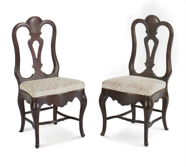 A SET OF TWELVE IBERIAN COLONIAL HARDWOOD CHAIRS,