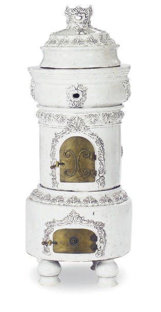 AN EARTHENWARE WHITE CRAQUELURE-GLAZED CIRCULAR STOVE,