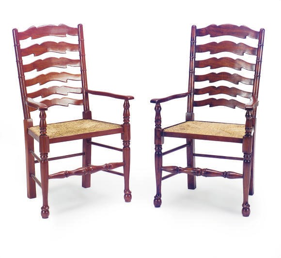 A GROUP OF FOUR MAHOGANY AND RUSH-SEAT ARMCHAIRS,