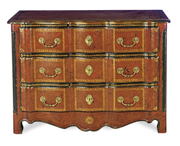 A RED-TOOLED LEATHER COMMODE,