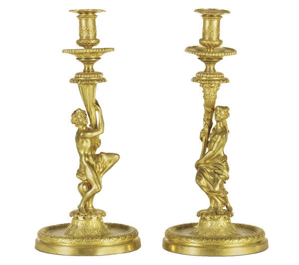 A PAIR OF FRENCH ORMOLU FIGURAL CANDLESTICKS,