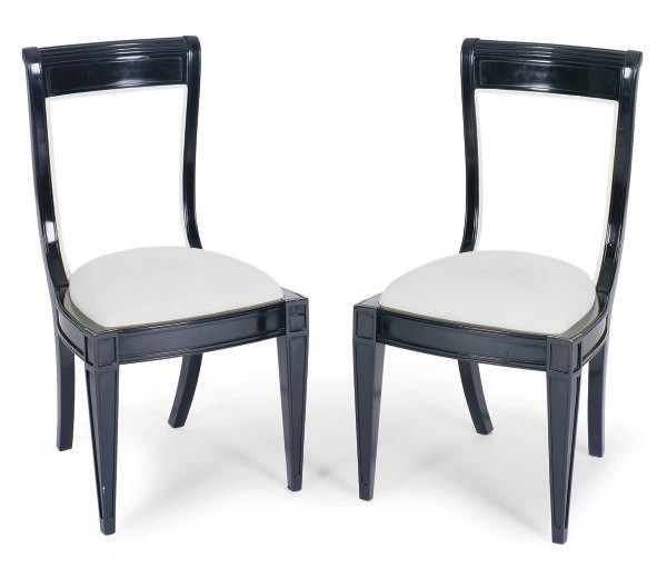 A SET OF THREE EBONIZED AND UPHOLSTERED SIDE CHAIRS,