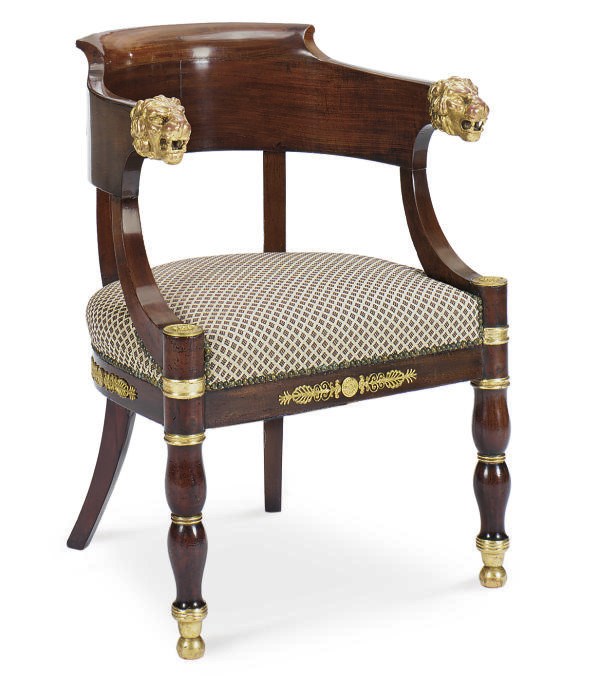 A FRENCH EMPIRE GILT-METAL MOUNTED MAHOGANY AND PARCEL-GILT FAUTEUIL,
