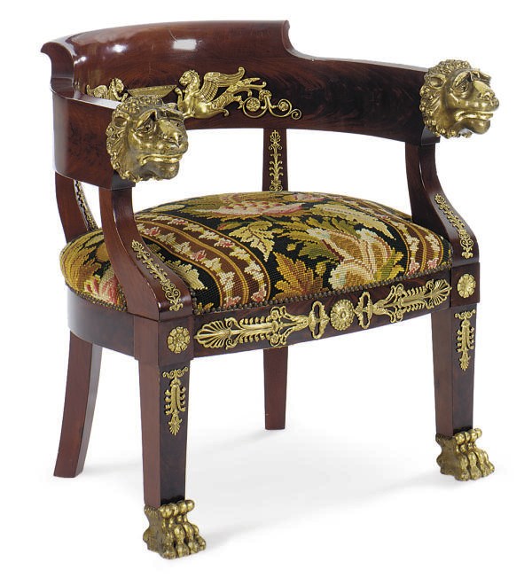 A FRENCH GILT-METAL MOUNTED AND PARCEL-GILT MAHOGANY FAUTEUIL,