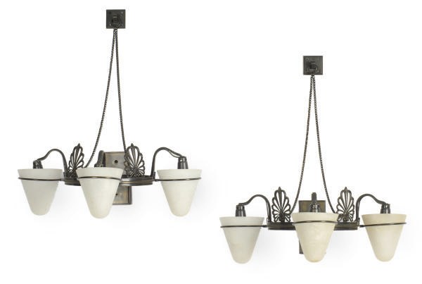 A PAIR OF PATINATED BRONZE AND ALABASTER THREE-BRANCH WALL-LIGHTS,